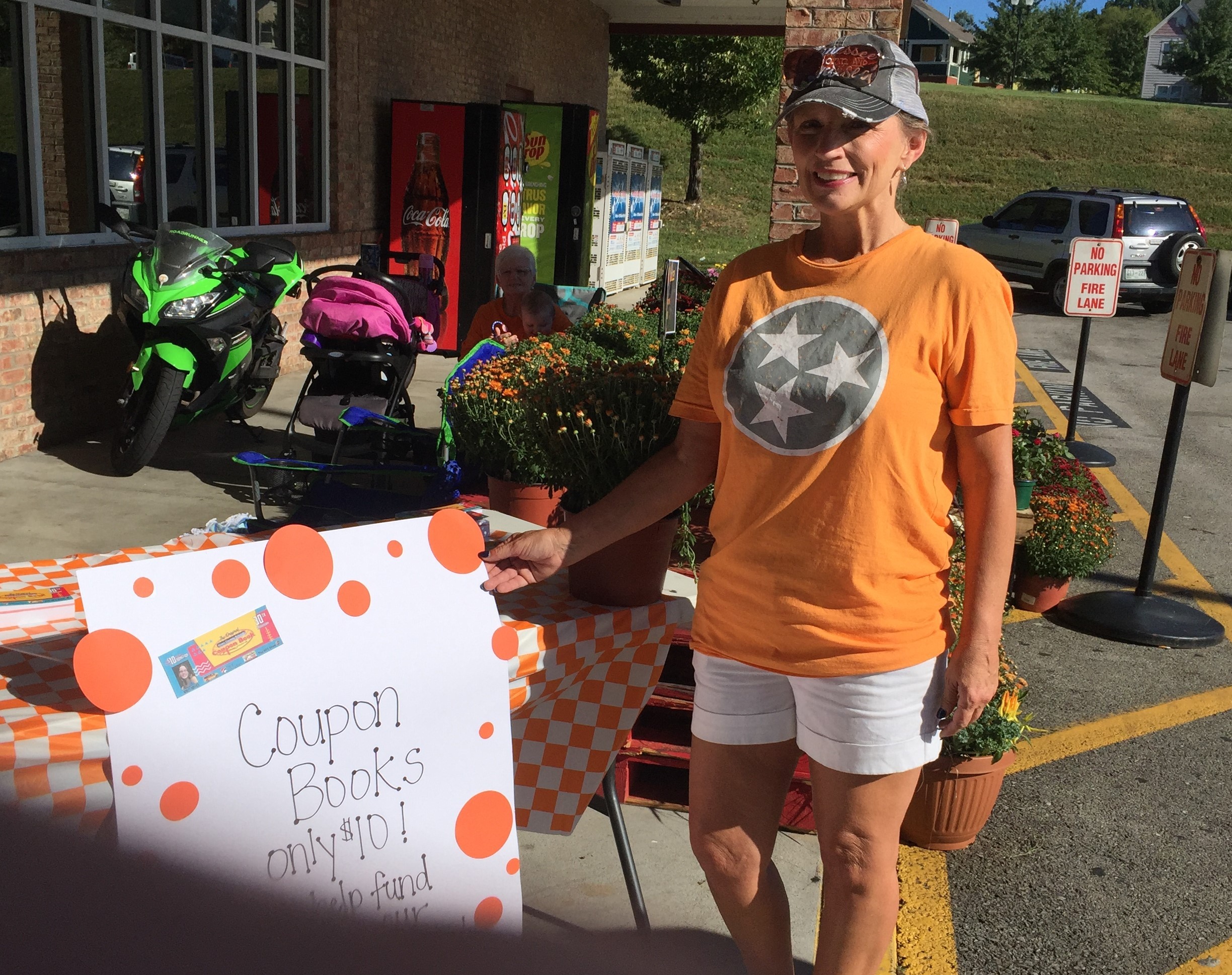 Teacher sells coupon books