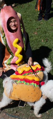 Gracie Barreira with Prince and Princess, in their hotdog costumes