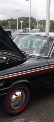 This car, with a sleek black and red look, came complete with a vintage drive-in tray.
