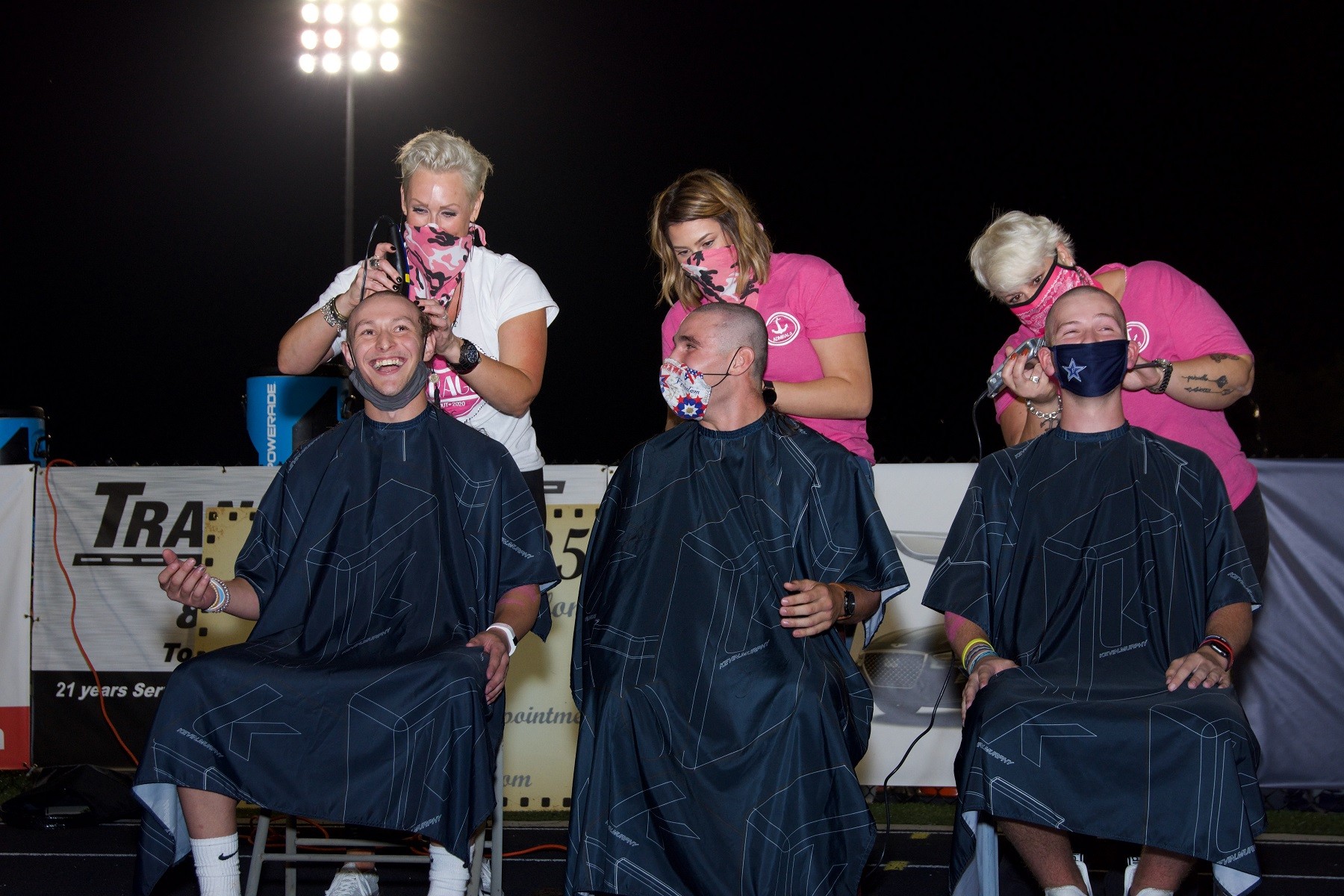 Farragut High seniors get a clean shave for Pink Out