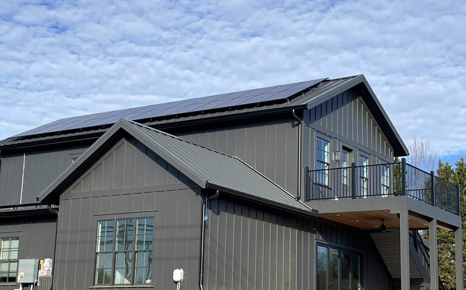 Custom builder enhances office with solar + storage