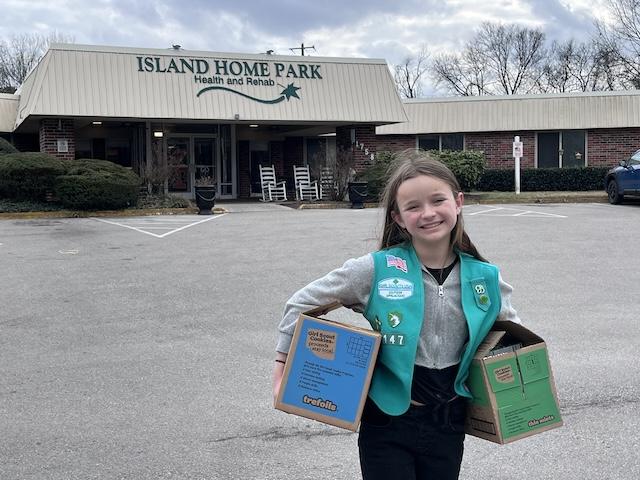 Girl Scout Maggie Lamb delivers to Hillcrest Healthcare