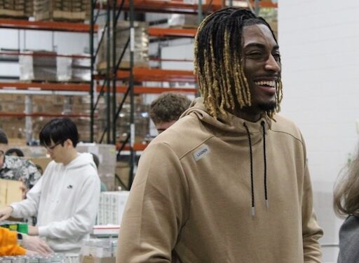 Jahmai Mashack surprises Second Harvest volunteers