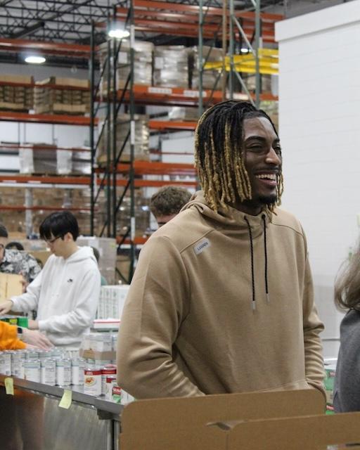 Jahmai Mashack surprises Second Harvest volunteers