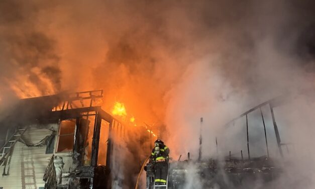 Building a total loss as KFD crews work hot spots