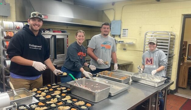Maryville College students help prepare hundreds of meals